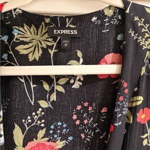 Express Black Top with Colorful Floral Design